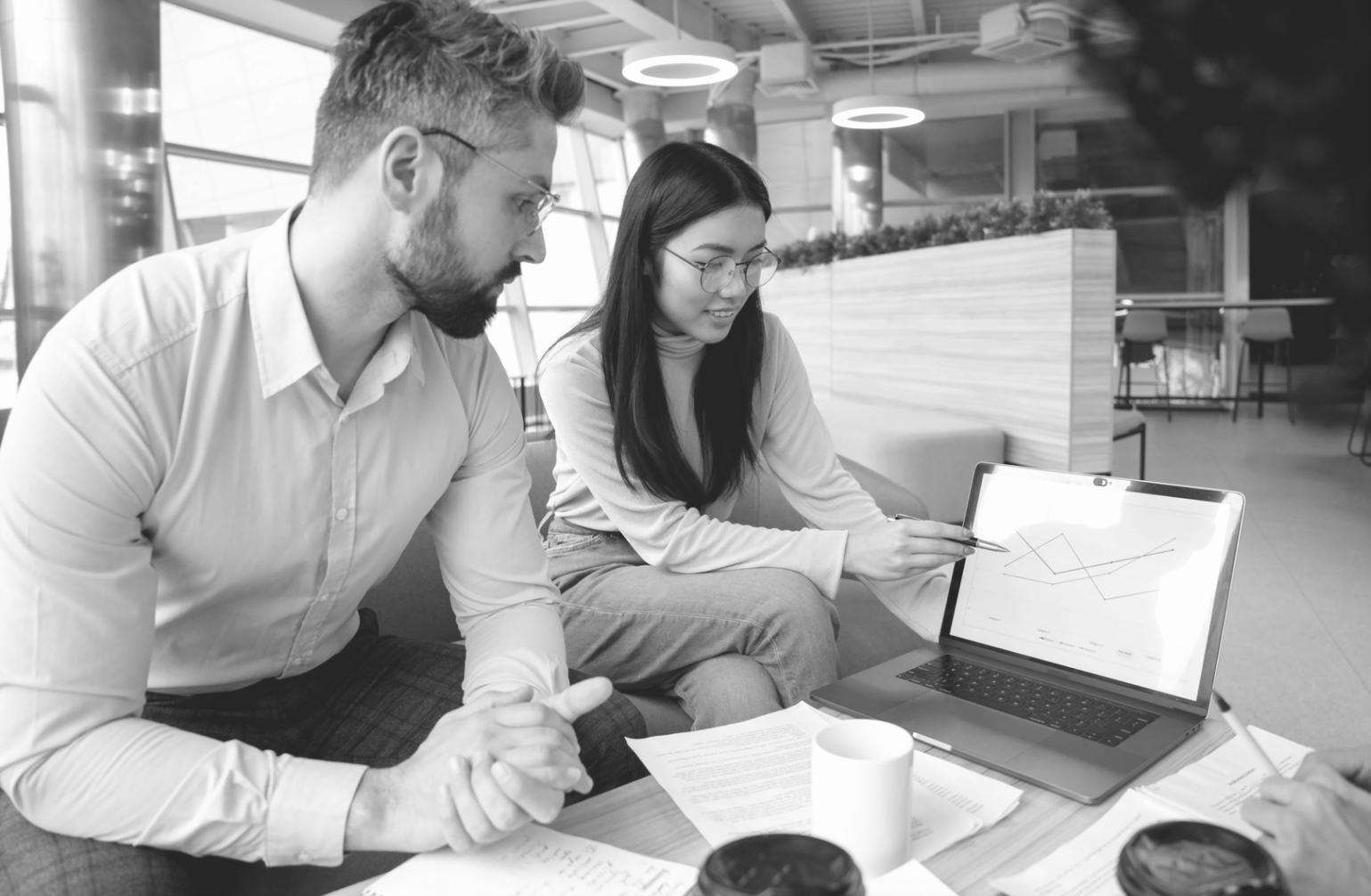 Financial analyst reviewing portfolio data and investment metrics